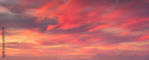 background of sunset cloudscape with red clouds © mimadeo