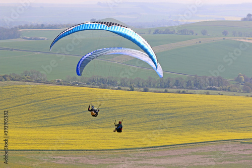 Paragliders flying at Milk Hill, Wiltshire 