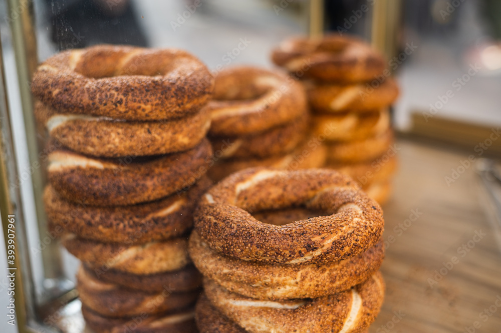 Street wagon in Turkey selling simit, a traditional Turkish street food. Street wagon in Turkey selling simit, a traditional Turkish street food.