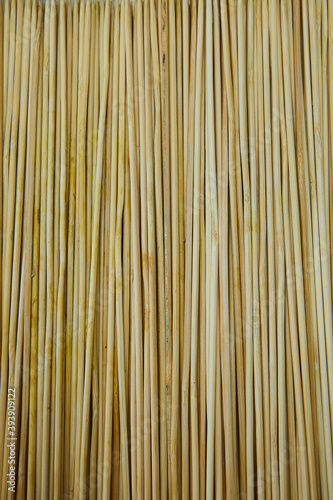 Fototapeta Naklejka Na Ścianę i Meble -  Texture horizontal new wooden skewers skewers for cooking.