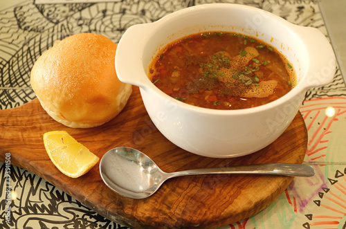 Healthy and tasty vegetable soup served with a slider bun