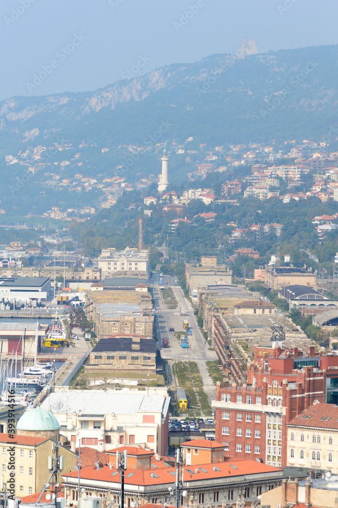 Aerial view of the city of Trieste with its old harbor under renovation, in Northern Italy
