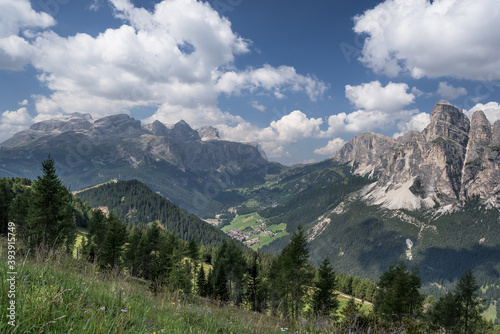 Sella mountain group and Sassongher mountain (from Left to Right) as seen from Piz La Ila and La Frainas mountain plateaus, La Villa, Val Badia, Alta Badia, Dolomites, South Tyro, Italy.