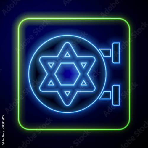 Glowing neon Jewish synagogue building or jewish temple icon isolated on blue background. Hebrew or judaism construction with David star. Vector.