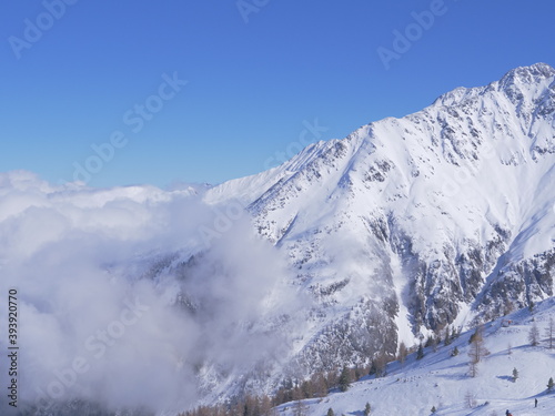 A view of the sunny mountains at Grands Montets. A ski aera in from of the Mont-Blanc and near the city of Chamonix.