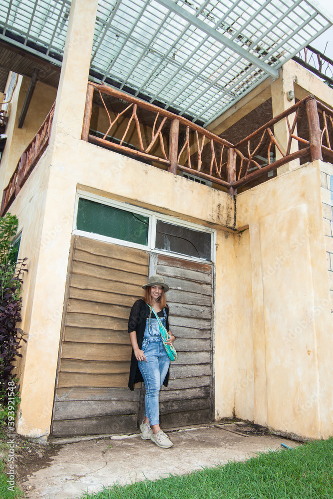 Girl with the house at Pai