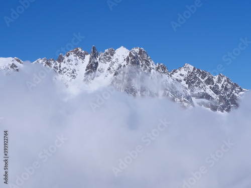 A view of the sunny mountains at Grands Montets. A ski aera in from of the Mont-Blanc and near the city of Chamonix.