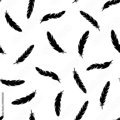 Black feathers seamless pattern on white background.