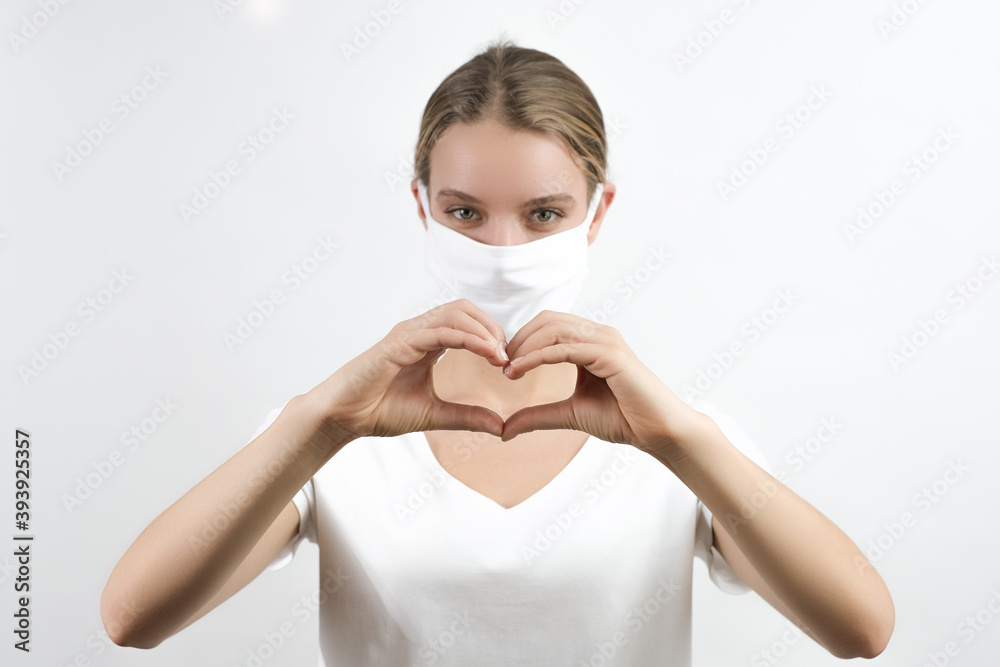 Portrait of her she nice attractive healthy girl wearing protection mask showing heart sign flu virus isolated bright in front of the white background
Portrait of her she nice attractive healthy girl wearing protection mask showing heart sign flu virus isolated bright in front of the white background