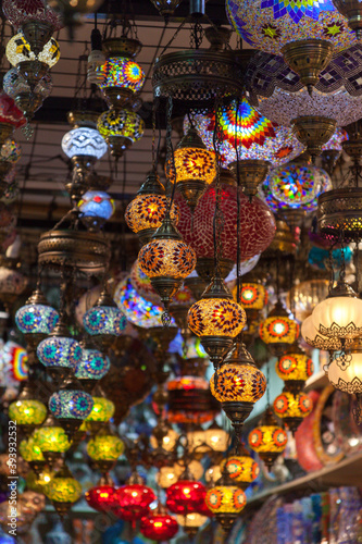 Hanging lamps in Grand Bazaar, Eminonu area in Istanbul, Turkey. The lamps are decorative and very colorful. Traditional lamp concept in Turkey, Ottoman style. © Caner