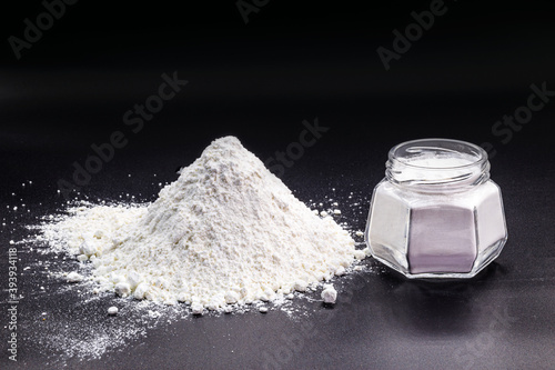 anhydrous monocalcium phosphate is produced chemically for commercial use. Used in the food industry as a buffer, fixing agent, chemical yeast, mineral supplement and nutrient. photo