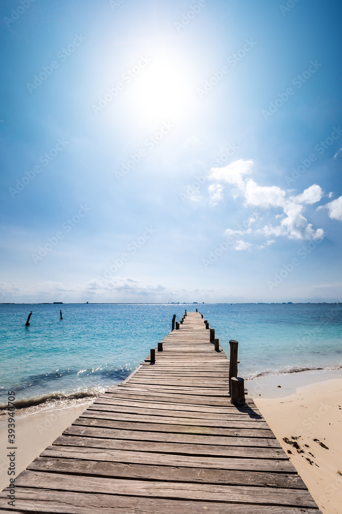 Wooden pier on tropical beach. Travel destinations Wooden pier on tropical beach. Travel destinations