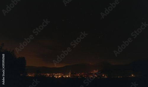 Stars and lights from Hejnice town in Jizerske hory mountains