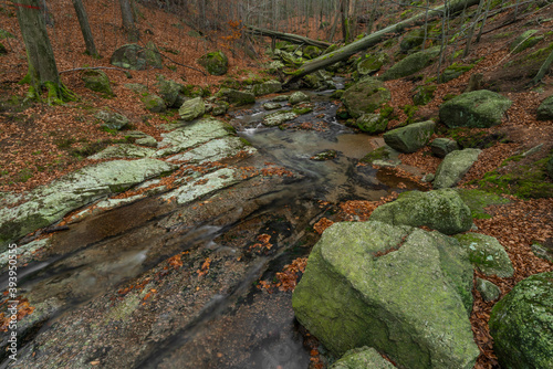 Maly Bily Stolpich waterfall in autumn fresh morning in Jizerske mountains photo