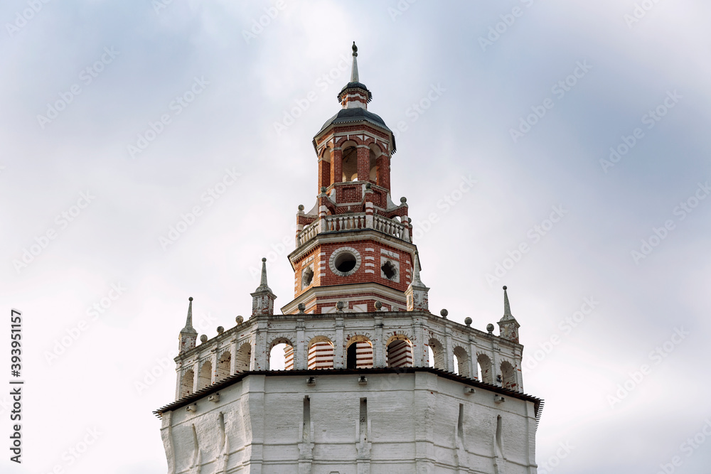 Temple in the Trinity Lavra of St. Sergius against the backdrop of a gloomy sky.