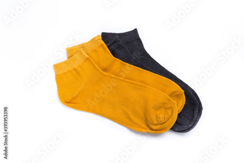 two pairs of colored short socks on a white background, top view