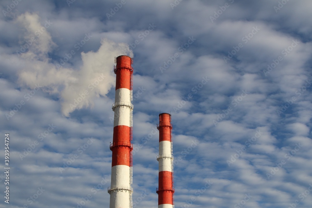 The two pipes on the background of beautiful cloudy sky The two pipes on the background of beautiful cloudy sky