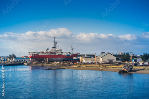 Punta Arenas / Magallanes y la Antartica Chilena Region / Chile.  February 14, 2018: Ships in the port area of ​​Punta Arenas in the Strait of Magallanes.