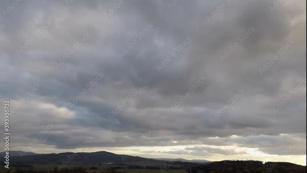 Cloud time lapse, white cumulus clouds on sky with mountain and meadow, Czech landscape Cloud time lapse, white cumulus clouds on sky with mountain and meadow, Czech landscape