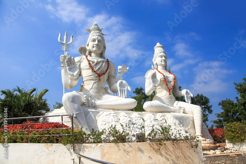 Hindu god and goddess lord Shiva and Parvathi statues on Kailasagiri hill in Andhra Pradesh state India