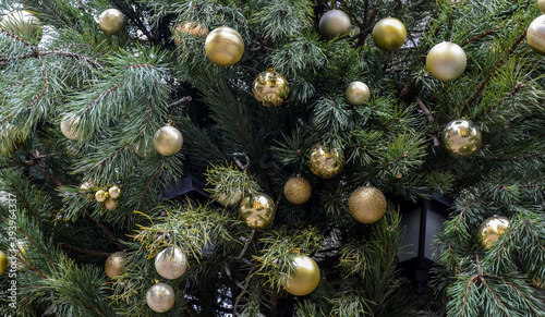 New Year Decoration. Balls and stars on a Christmas tree. Festive decoration of the city. 