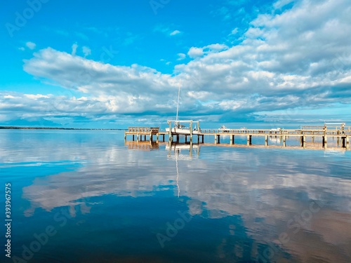 Morning reflections over Bogue Sound. Morehead City, North Carolina  photo