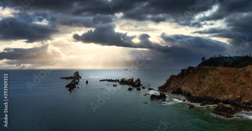 Cannon Beach  Oregon  United States. Beautiful Aerial Panoramic View of the Rocky Pacific Ocean Coast. Dramatic Cloudy Sunset Sky.