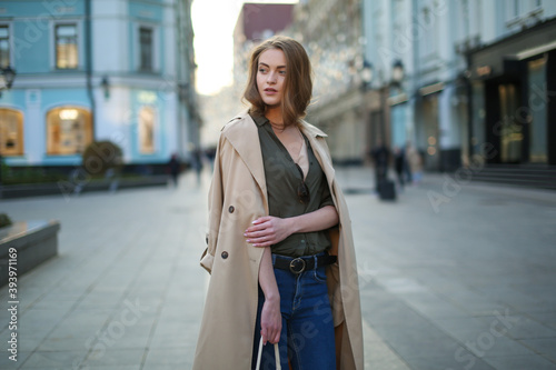 Tableau sur toile beautiful woman walking in the city in spring
