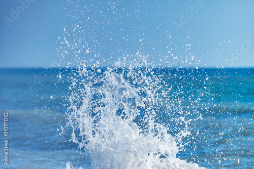 Wave of the sea water at sunny day time.