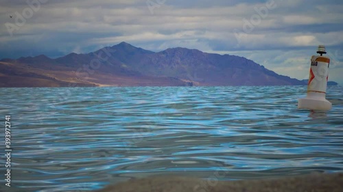 Great Salt Lake State Park. The navigational buoy swings on the water in the Great Salt Lake, Utah photo