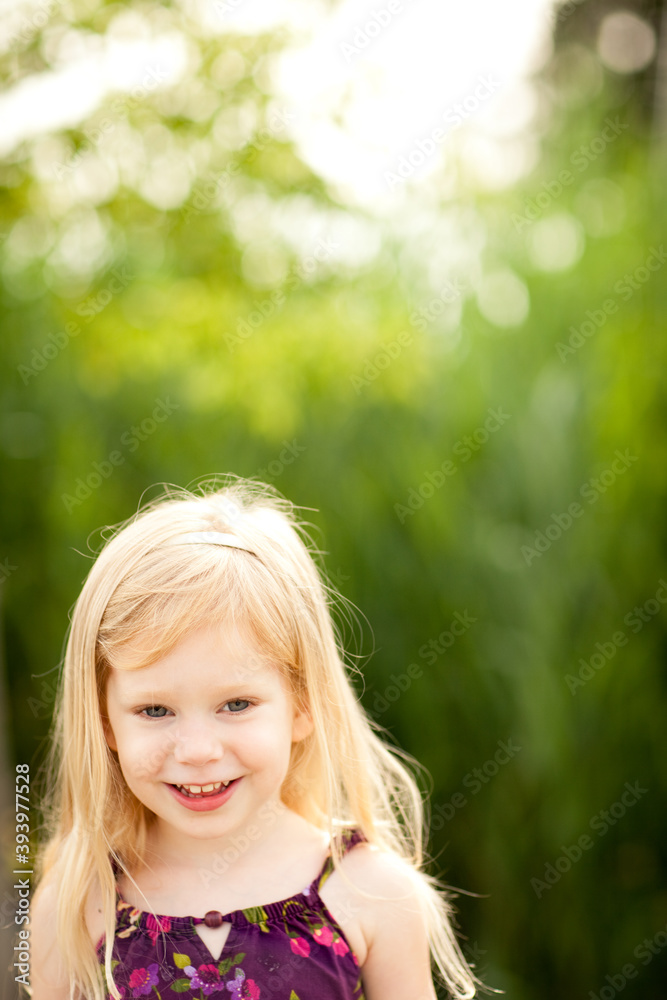 Little Girl with Blond Hair Enjoying a Summer Day Outside, Childhood Lifestyle Portrait Little Girl with Blond Hair Enjoying a Summer Day Outside, Childhood Lifestyle Portrait