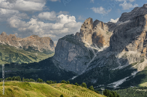 Sella group, plateau-shaped mountain massif in the Dolomites, north of the Marmolada and  east of Sasso Lungo, seen from the trail to Sella pass & Sella refuge from Comici refuge, South Tyrol, Italy. photo