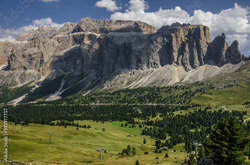 Sella group, plateau-shaped mountain massif in the Dolomites, north of the Marmolada and  east of Sasso Lungo, seen from the trail to Sella pass & Sella refuge from Comici refuge, South Tyrol, Italy. photo