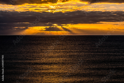 Rocky beach in Cobeta Fuma, Alicante, Spain, at sunrise photo