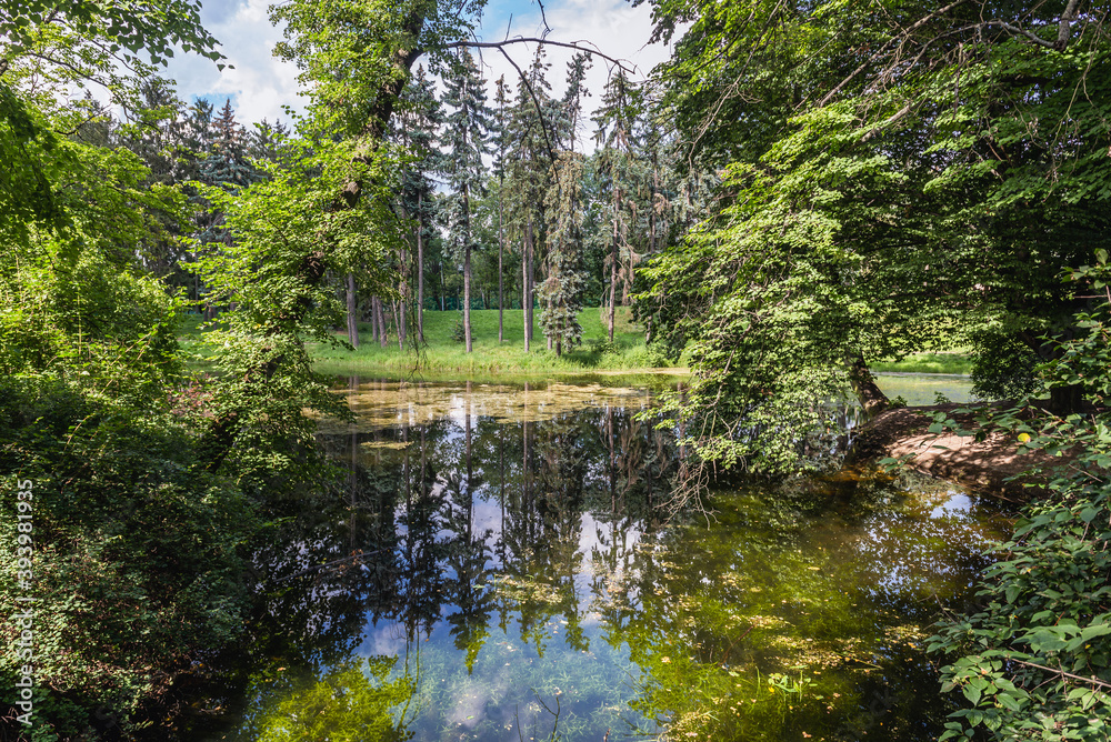 Pond in Skaryszewski Park - monumental park in the Praga Poludnie district of Warsaw, capital city of Poland Pond in Skaryszewski Park - monumental park in the Praga Poludnie district of Warsaw, capital city of Poland