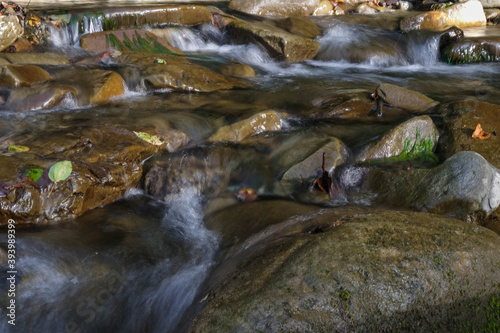 Long Exposure shot of water flowing into a stream. Carpathians, Ukraine.