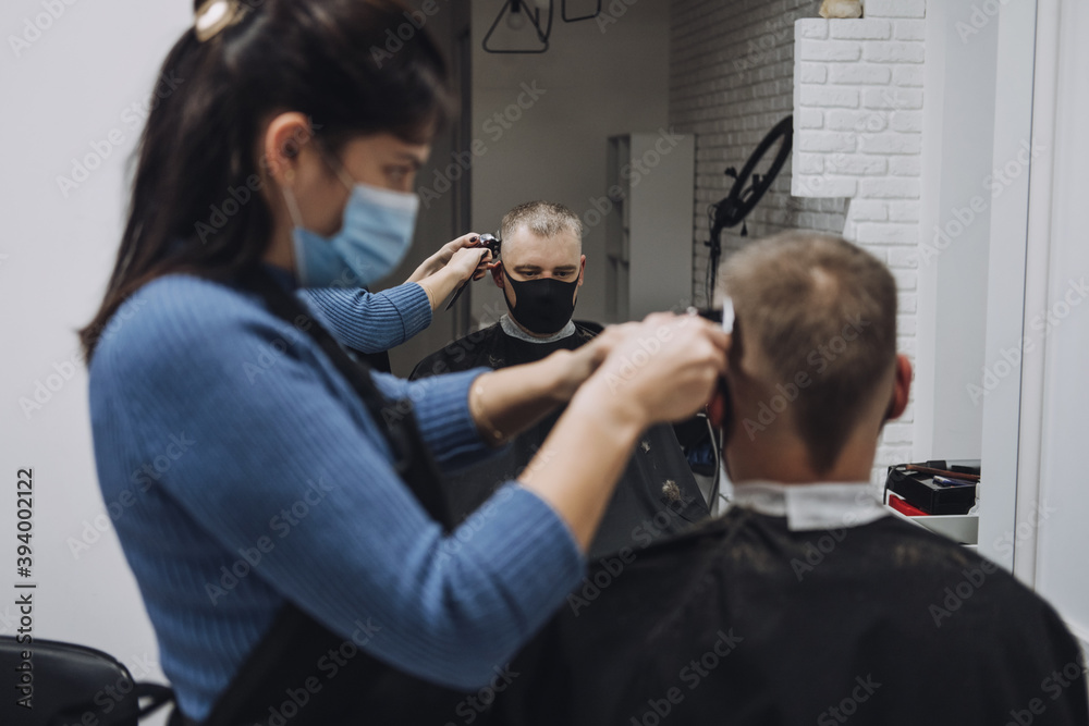 Barber shops, hair salons shutting down, second lockdown. Hairdresser