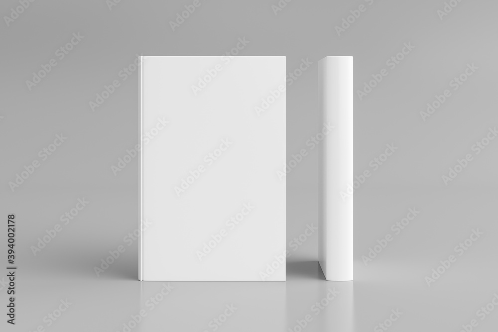 Two hardcover vertical white mockup books standing on the white background. Blank front cover and spine of book. Two hardcover vertical white mockup books standing on the white background. Blank front cover and spine of book.