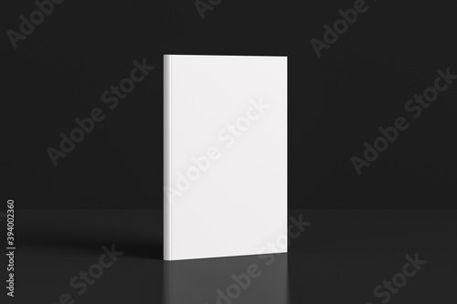 Hardcover vertical white mockup book standing on the black background.