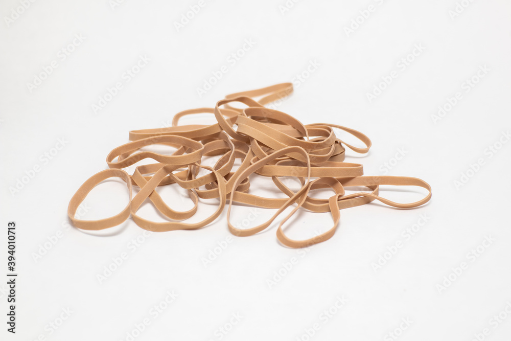 Rubber Bands Lying In A Pile On A White Backdrop