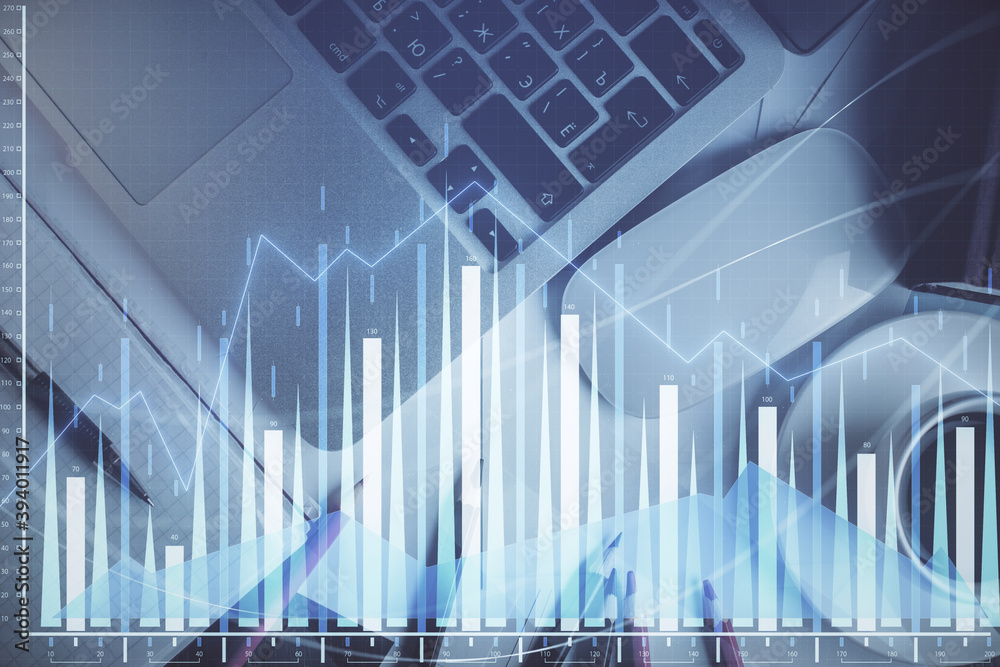 Double exposure of financial chart drawing over table background with computer. Concept of research and analysis. Top view. Double exposure of financial chart drawing over table background with computer. Concept of research and analysis. Top view.