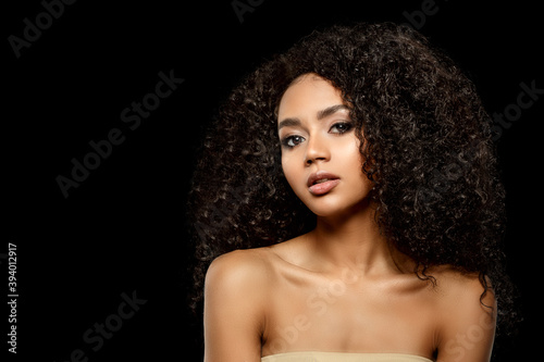 Beauty black skin woman African Ethnic female face. Young african american model with long afro hair. Lux model in black