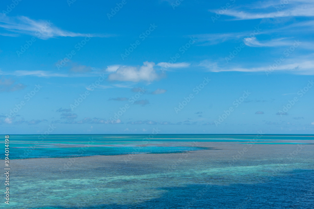 blue sky and sea with coral reef