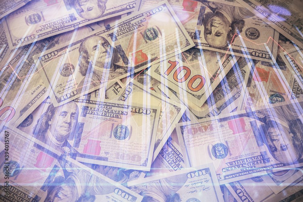 Multi exposure of forex chart drawing over us dollars bill background. Concept of financial success markets. Multi exposure of forex chart drawing over us dollars bill background. Concept of financial success markets.