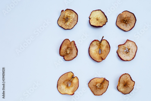 Dried apple slices on white background