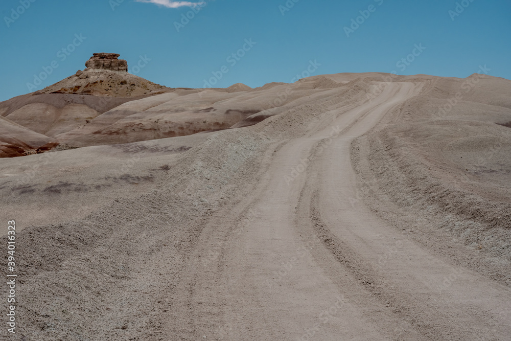 Eroded Dirt Road over Hill