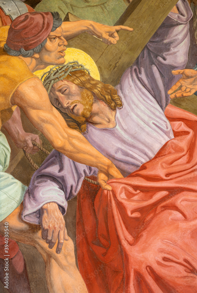 VIENNA, AUSTIRA - OCTOBER 22, 2020: The detail of fresco Fall of Jesus undwer the cross  as part of Cross way station in the church of St. John the Nepomuk by Josef Furlich (1844 - 1846).