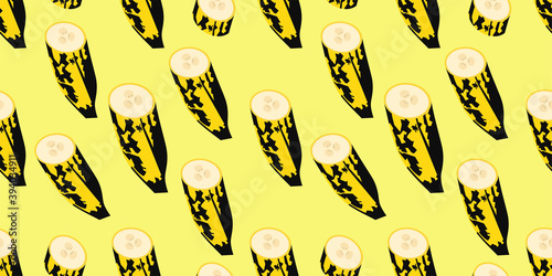 Seamless vector pattern of extra ripe single banana and sliced banana isolated on light yellow background. Suits for Decorative Paper, Packaging, Covers, Gift Wrap, etc. Vector illustration EPS10. © Cipta