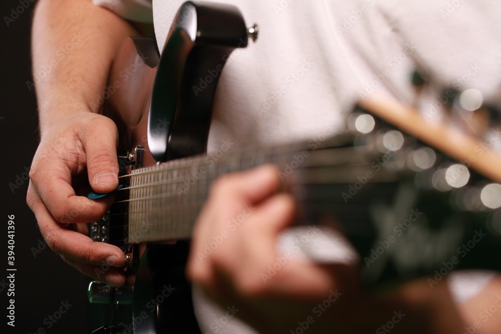 Fototapeta premium Man playing electric guitar