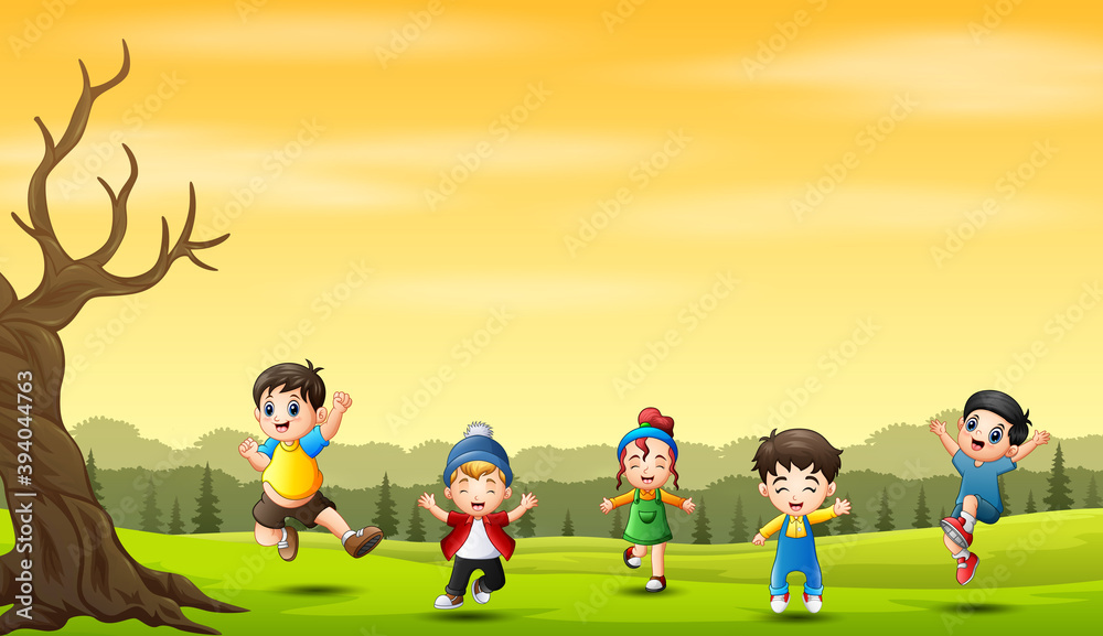 Cheerful little kids jumping and laughing in nature background